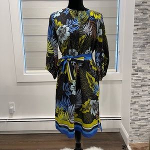 Crafted of sumptuous silk, the Celine shirtdress is classically styled